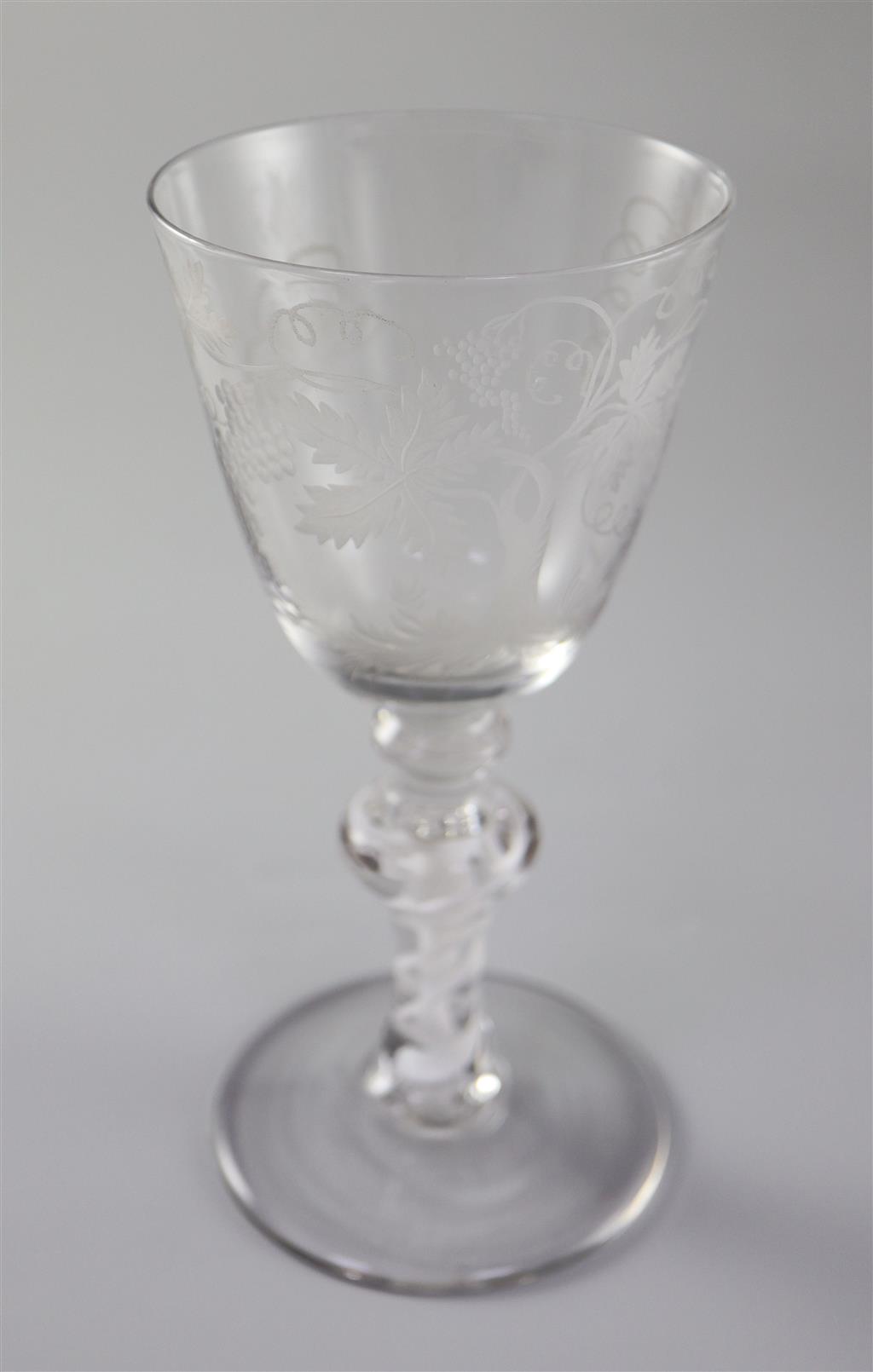 A cotton stem goblet, English or Dutch, c.1765-70, with Beilby design engraving, 19.5cm high